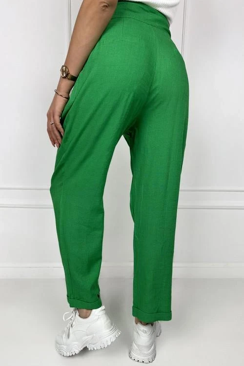 Women's trousers with asymmetric buttons